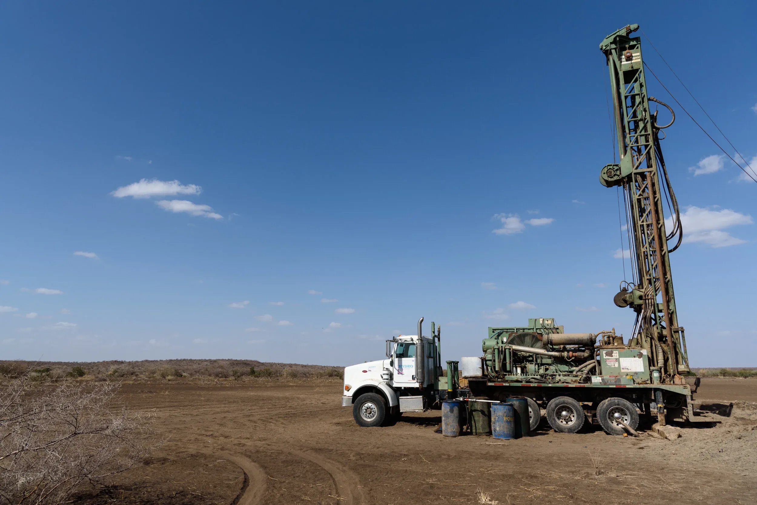 A drilling rig sinking a new borehole on open land in Afar